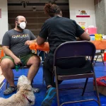 A man gets the monkeypox vaccine