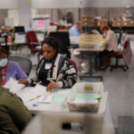 Election workers process ballots for U.S. midterm elections in Georgia