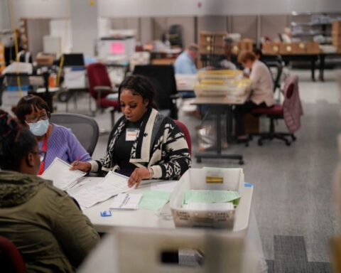 Election workers process ballots for U.S. midterm elections in Georgia