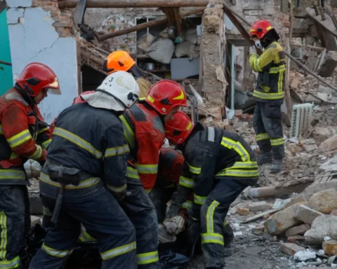 e body of a woman found under debris