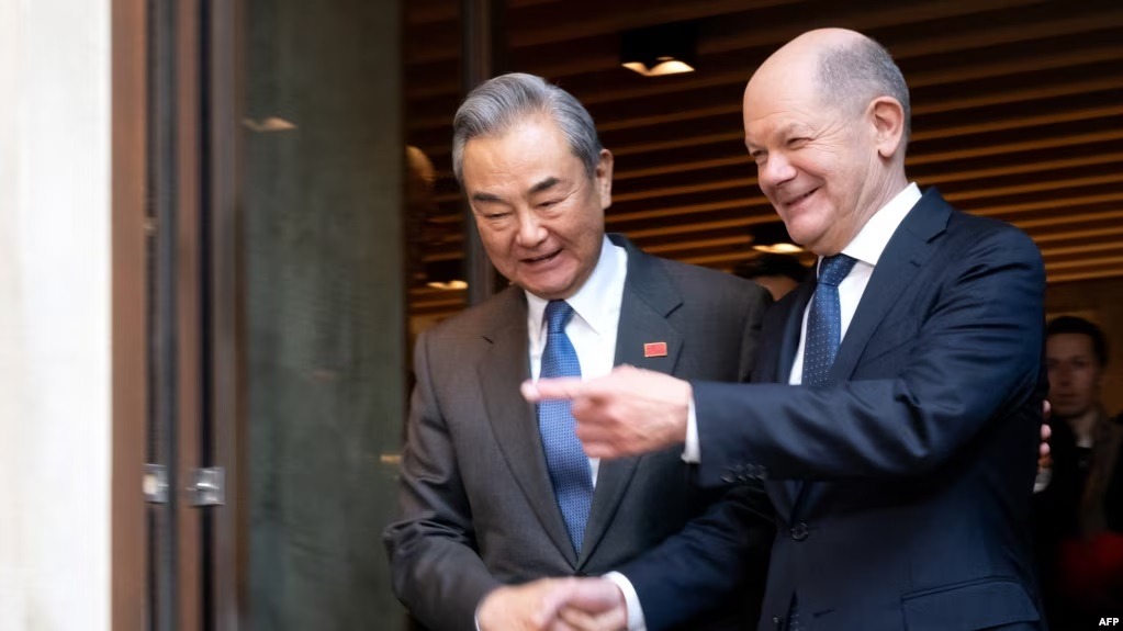 German Chancellor Olaf Scholz and Chinese Foreign Minister Wang Yi